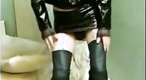 Sissy Sandracduk posing in leather outfit