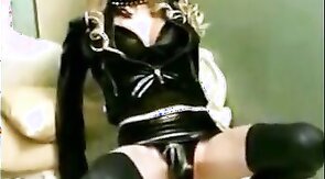 Sissy Sandracduk posing in leather outfit