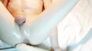 Slim Oiled Twink Puts A Giant Dildo Up His Ass