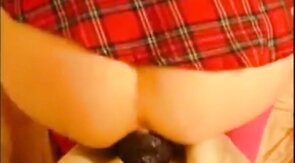 bitch in miniskirt and pink stockings riding her big dildo