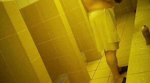 Naked men in public pool shower