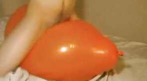 Big inflatable orange balloon humping cum