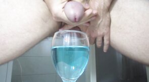 Ejaculating creamy cumshot into a cup of water #2