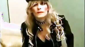 Sissy Sandracduk posing in leather outfit