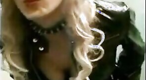 Sissy Sandracduk posing in leather outfit