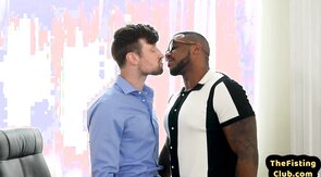 Black fisting hunk fists and sucks white jock in office