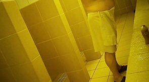 Naked men in public pool shower