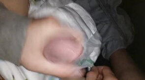 Twink cumming his wet diaper