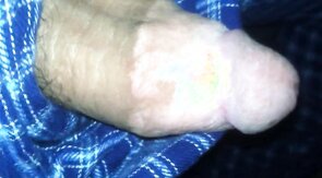 big fat plum headed cock snakes its way out of pajama pants