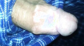 big fat plum headed cock snakes its way out of pajama pants