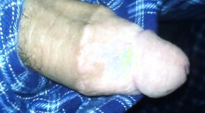 big fat plum headed cock snakes its way out of pajama pants