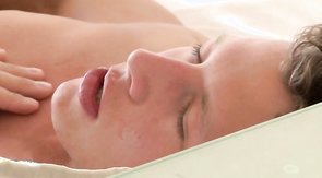 Impressive lad is wanking his wide sausage in the bedroom