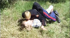 Sweet officer is giving a blowjob in the public park