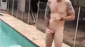 Married hunk jerks off over the pool while smoking