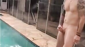 Married hunk jerks off over the pool while smoking