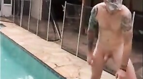 Married hunk jerks off over the pool while smoking