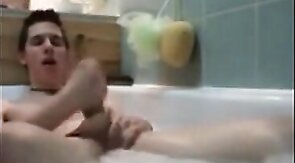 Twink jerking off in bathtub