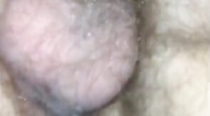 Bareback bottom gets a load