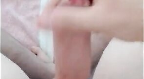 Boy jerking off uncut dick and cums