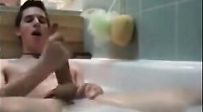 Twink jerking off in bathtub