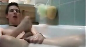 Twink jerking off in bathtub