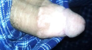 big fat plum headed cock snakes its way out of pajama pants