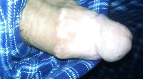 big fat plum headed cock snakes its way out of pajama pants