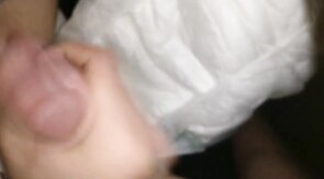 Twink cumming his wet diaper