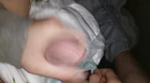 Twink cumming his wet diaper
