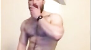 Hung and hairy British hunk wanking