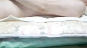 Asian grandpa jerking off on the bed