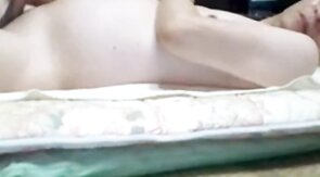 Asian grandpa jerking off on the bed